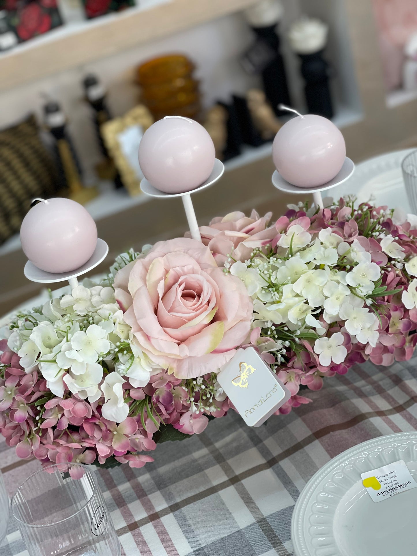 Centrotavola con candele di FIORI DI LENA