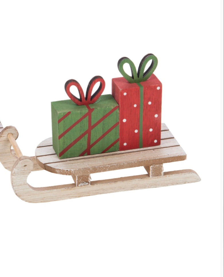 Slitte con pacchetto regalo: un dettaglio con incanta