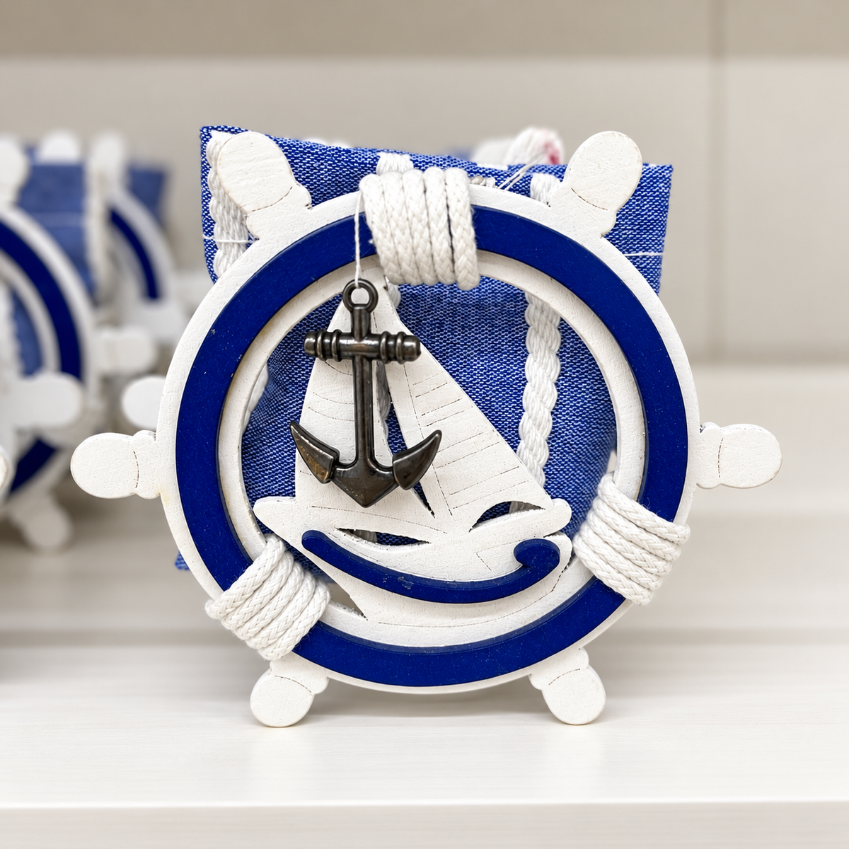 Bomboniera tema mare con barca a vela – blu e bianco