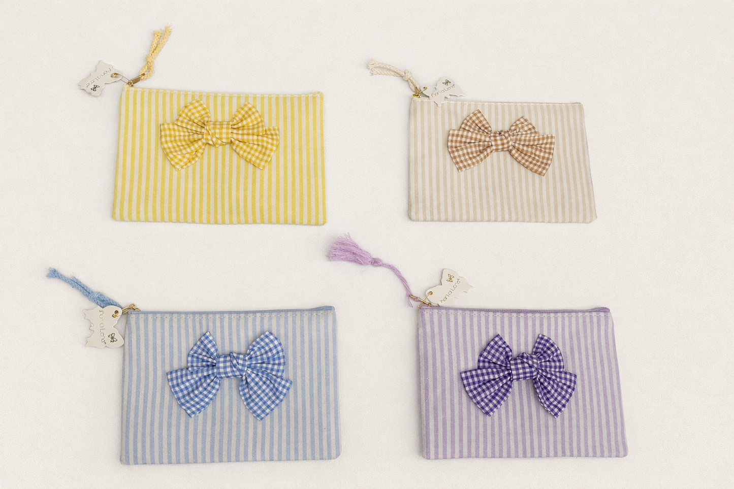 Pochette con zip e fiocco in tessuto – Fiori di Lena