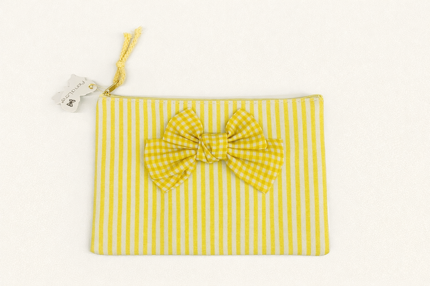 Pochette con zip e fiocco in tessuto – Fiori di Lena